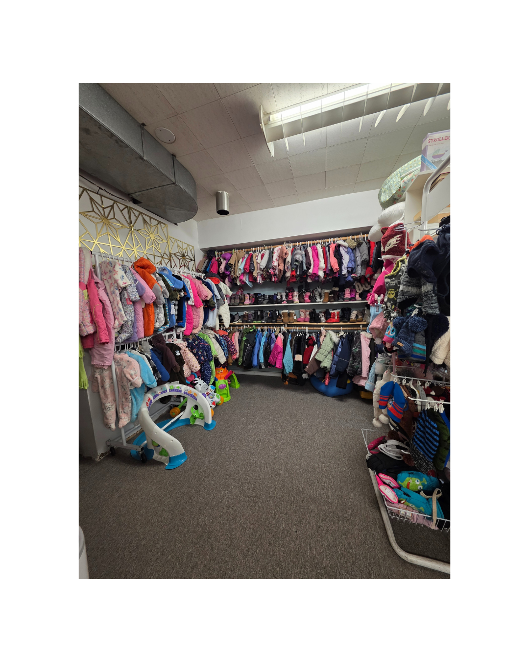 Kid Stuff clothing racks wide view